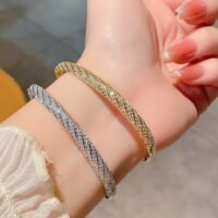 Diamond-encrusted Rhombus Bangle Smooth Surface Crisscross Design